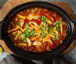 Slow cooker meal with lots of veggies in a tomato based sauce